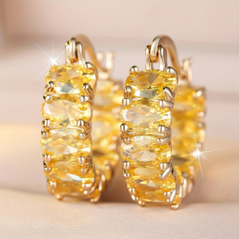 Gold-Tone White Crystal Egg-Shape Huggie Earrings