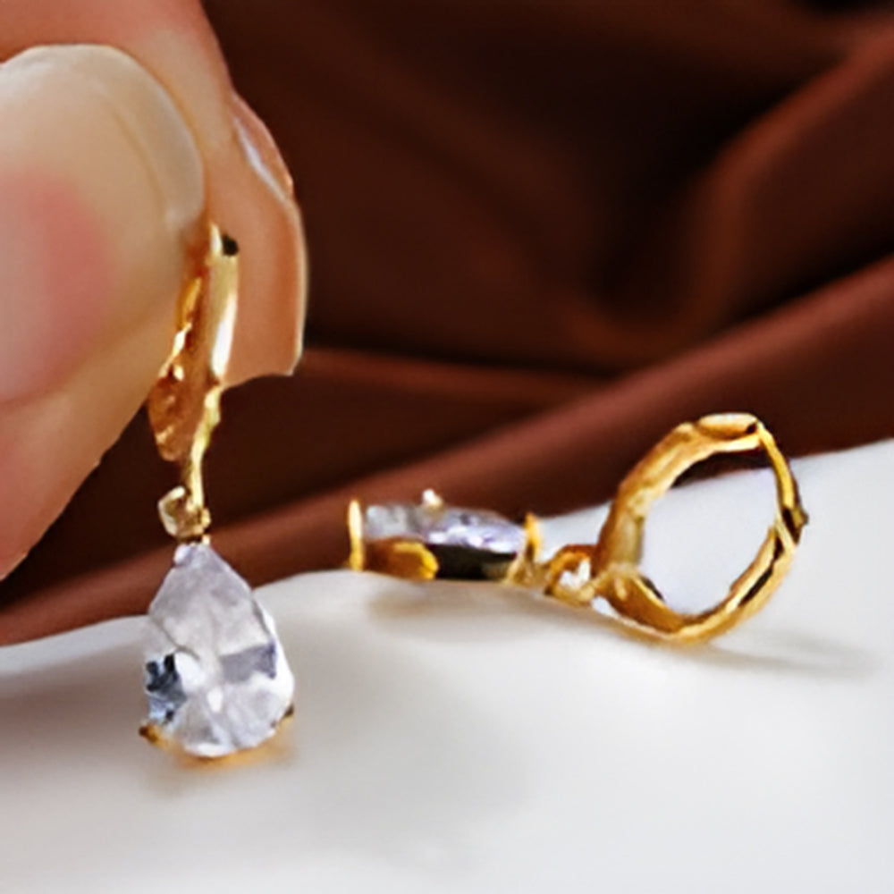 Gold-Tone White Crystal Three-Prong Pear Drop Huggie Earrings