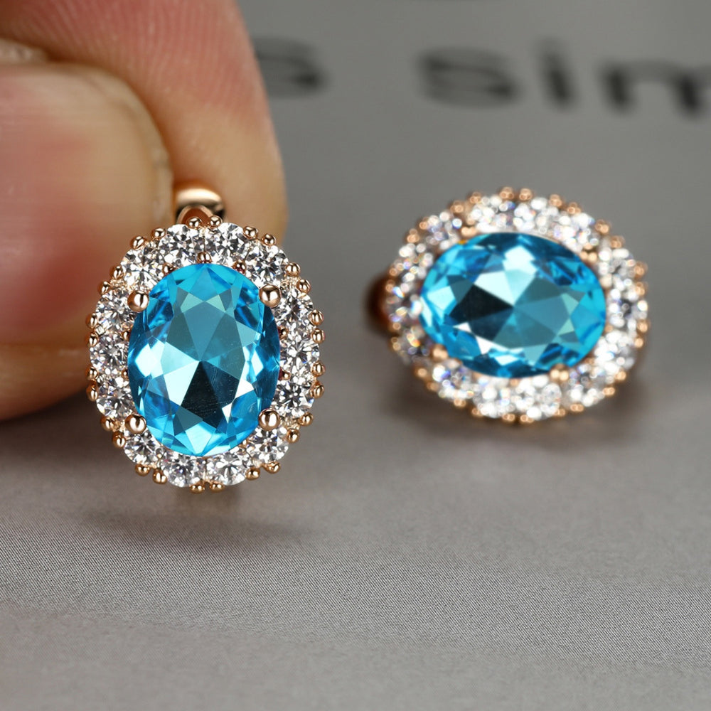 Champagne Gold-Tone Aqua-Blue Oval Crystal Halo Huggie Earrings