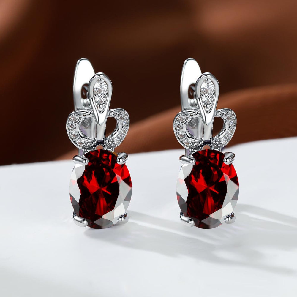 Silver-Tone Red Oval Crystal Huggie Earrings With Crown Accent