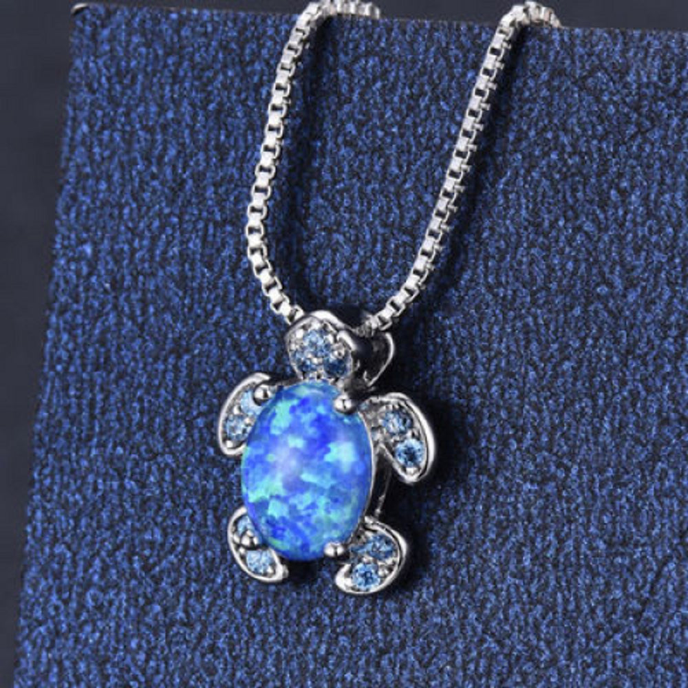 Sterling Silver Blue Simulated Opal Turtle Necklace