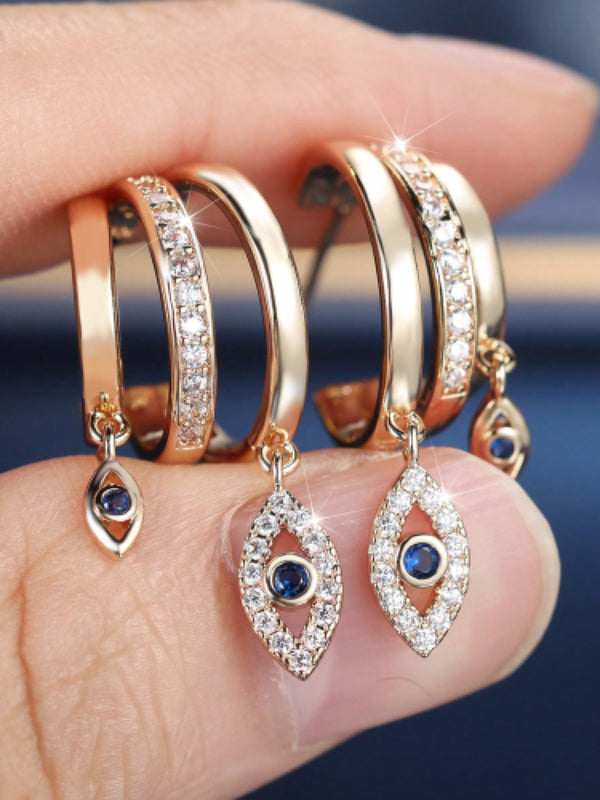 Gold-Tone White Crystal Evil Eye Charm Huggie Hoop Earrings