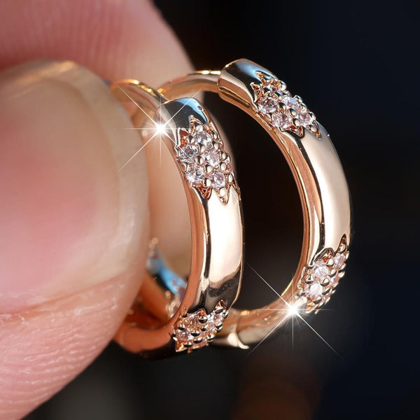 Gold-Tone Huggie Hoop Earrings with White Crystal Star Clusters