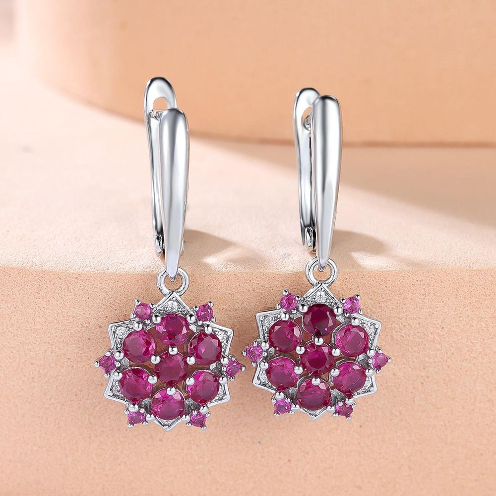 Silver-Tone White Round Crystal Sunflower Huggie Earrings
