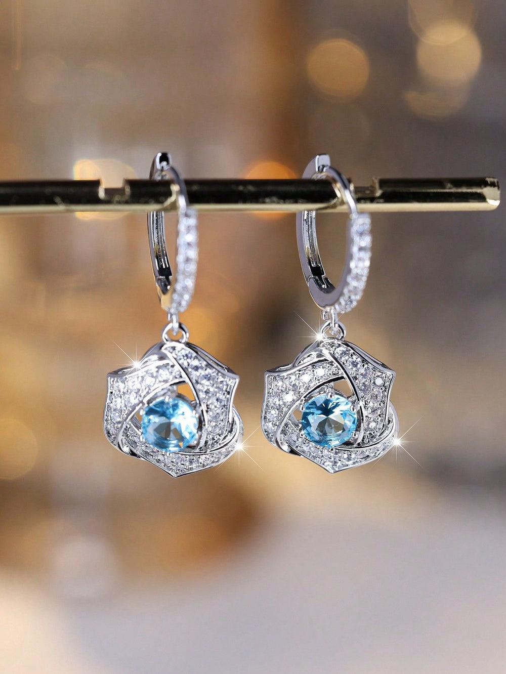 Silver-Tone Aqua Blue Crystal Pave Swirl Drop Earrings