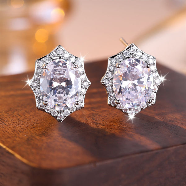 Silver-Tone White Oval Crystal Starburst Halo Stud Earrings