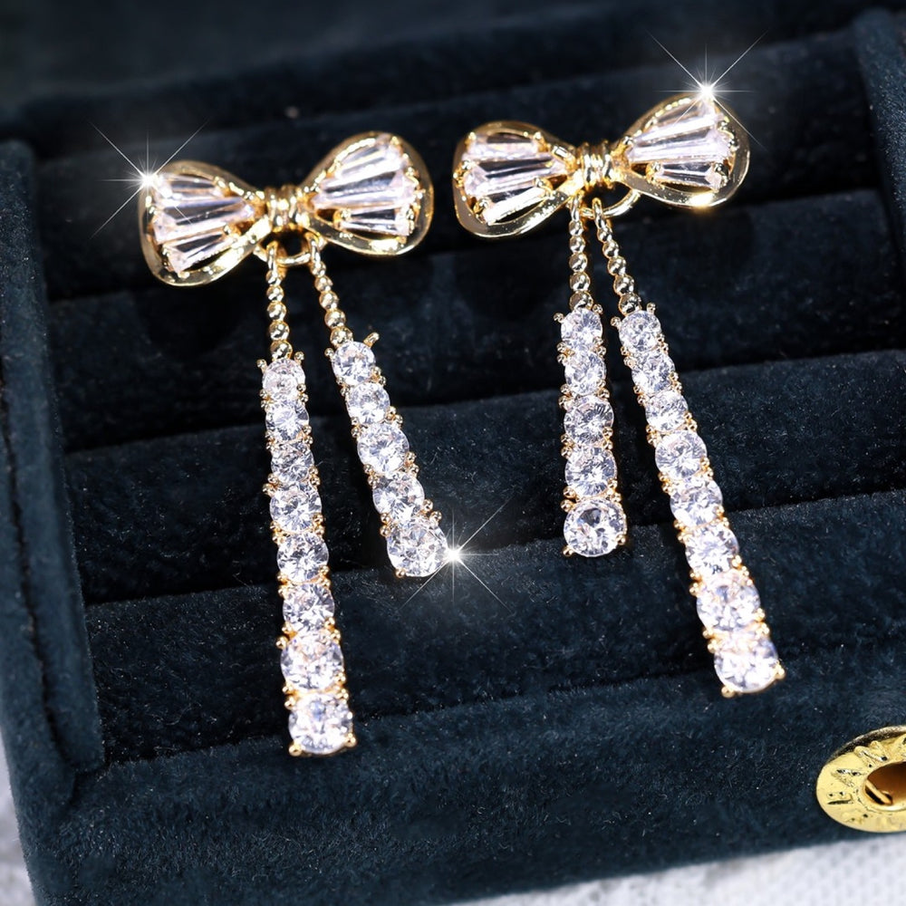 Gold-Tone White Crystal Bow Stud Earrings with Tassel Drops