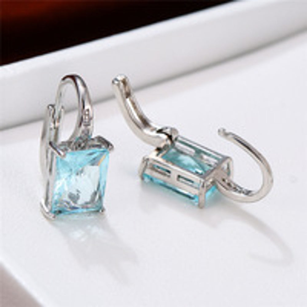 Silver-Tone Light Blue Baguette Crystal Huggie Earrings