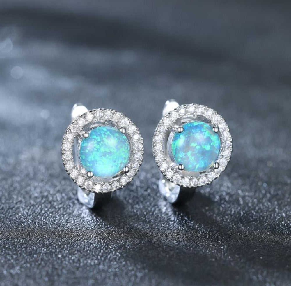 Sterling Silver Blue Round Simulated Opal Huggie Earrings