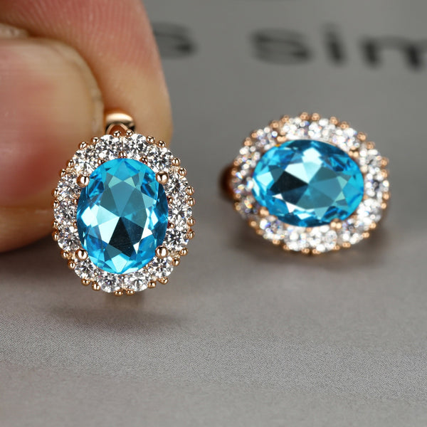 Champagne Gold-Tone Aqua-Blue Oval Crystal Halo Huggie Earrings