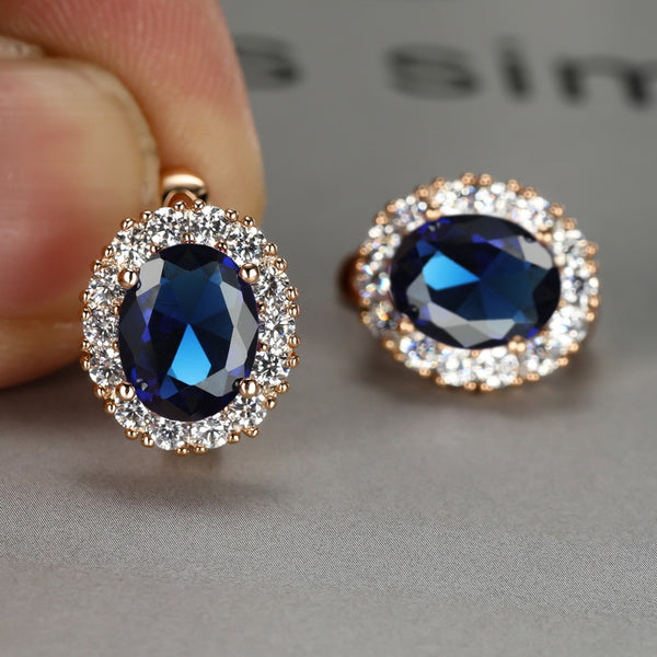 Champagne Gold-Tone Royal Blue Oval Crystal Halo Stud Earrings