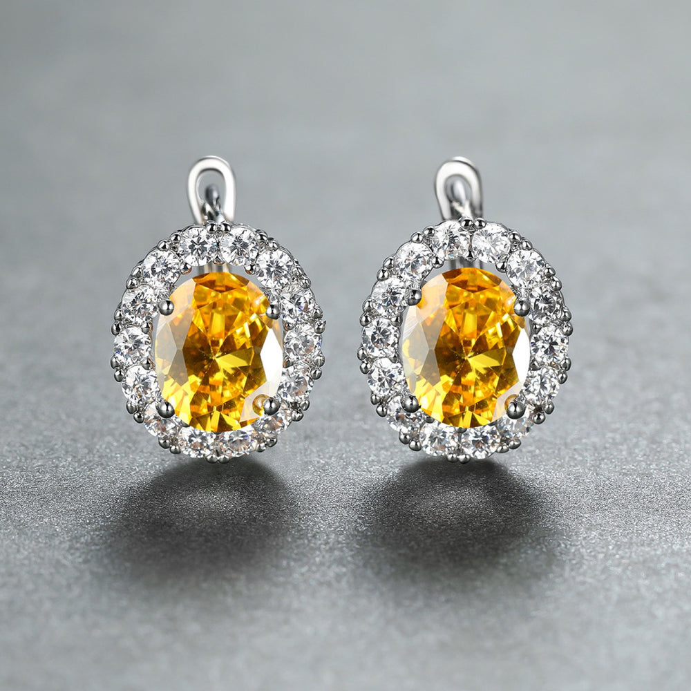 Silver-Tone Oval Yellow Crystal Halo Huggie Earrings