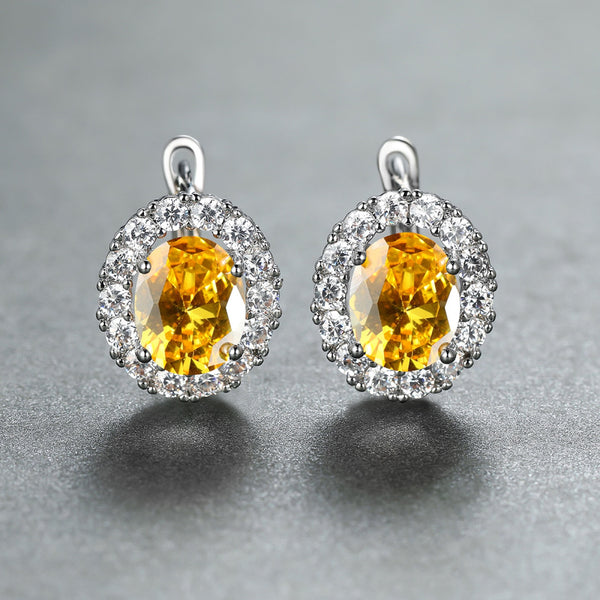 Silver-Tone Oval Yellow Crystal Halo Huggie Earrings