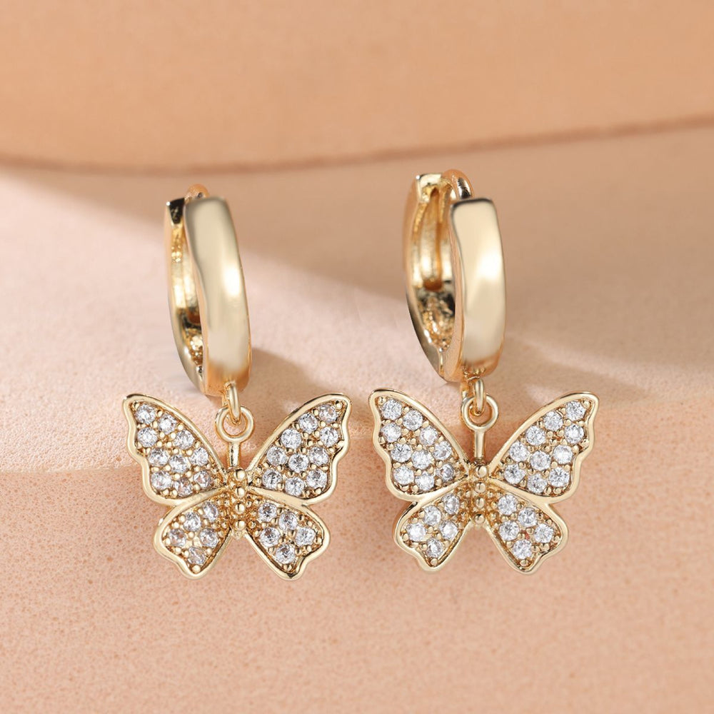 Gold-Tone White Crystal Pavé Butterfly Charm Huggie Earrings