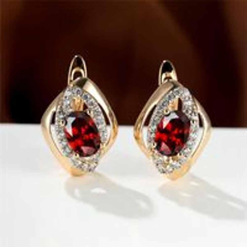 Champagne Gold-Tone Four-Prong Red Crystal Huggie Earrings