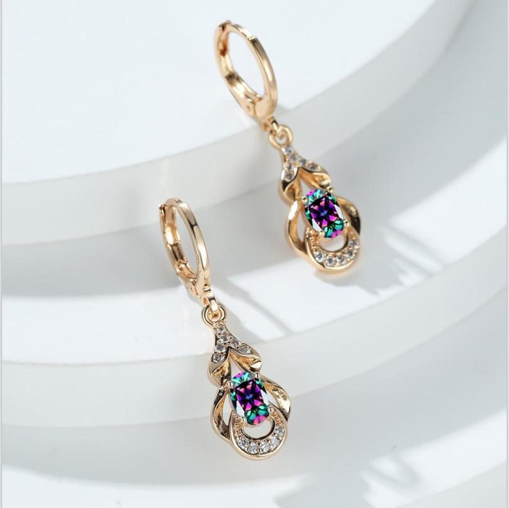 Champagne Gold-Tone Iridescent Oval Crystal Huggie Earrings
