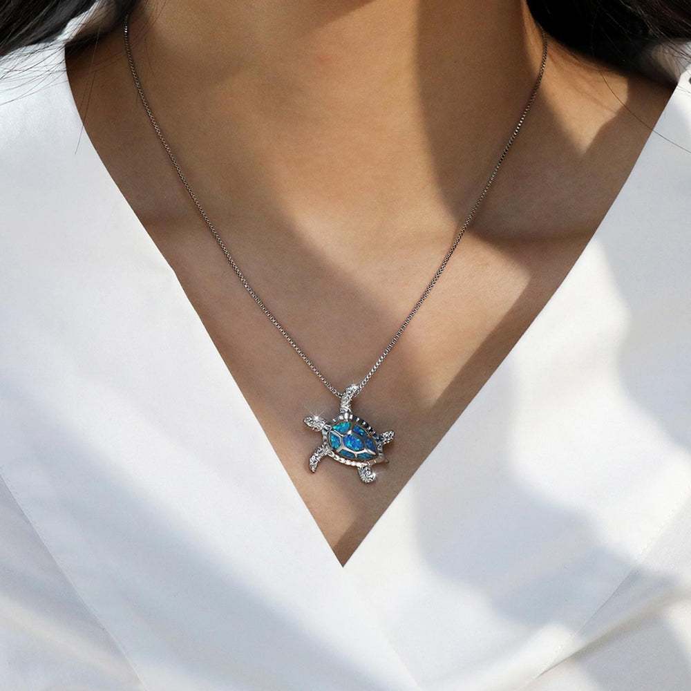 Sterling Silver Blue Simulated Opal Turtle Necklace