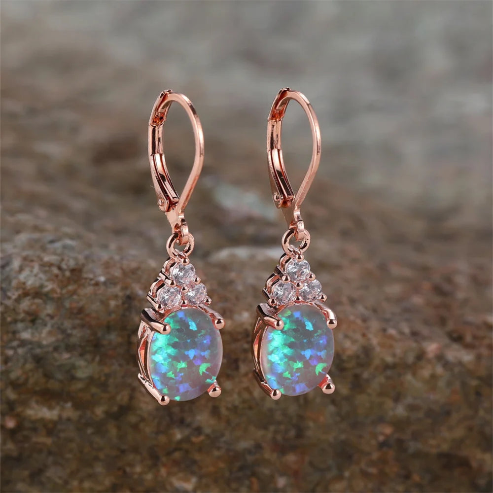 Rose Gold-Tone Blue Simulated Opal Oval Four-Prong Drop Earrings