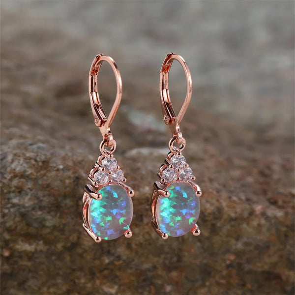 Rose Gold-Tone Blue Simulated Opal Oval Four-Prong Drop Earrings