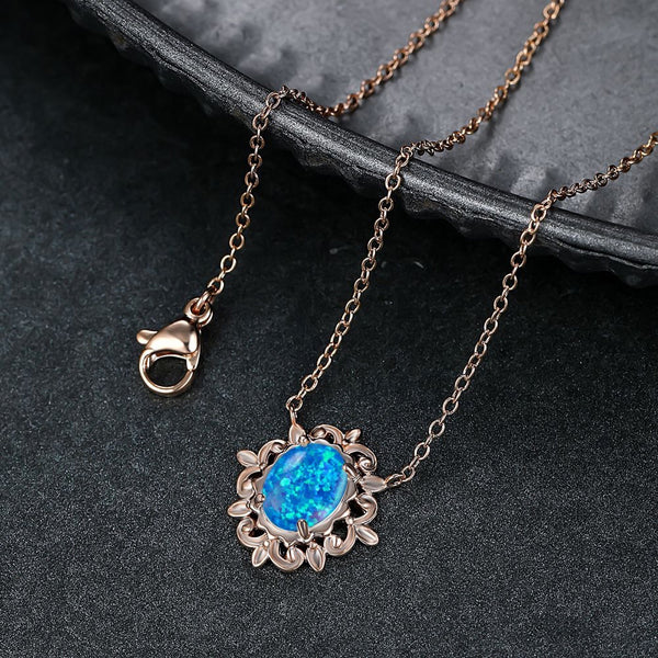 Champagne Gold-Tone Blue Simulated Opal Oval Scroll Frame Pendant Necklace