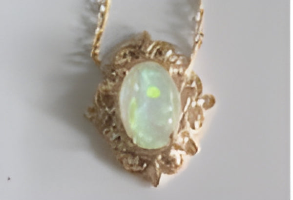 Champagne Gold-Tone White Simulated Opal Oval Scroll Frame Pendant Necklace