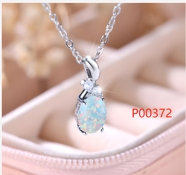 Silver-Tone Oval White Simulated Opal Pendant Necklace With Twin Crystal Accents