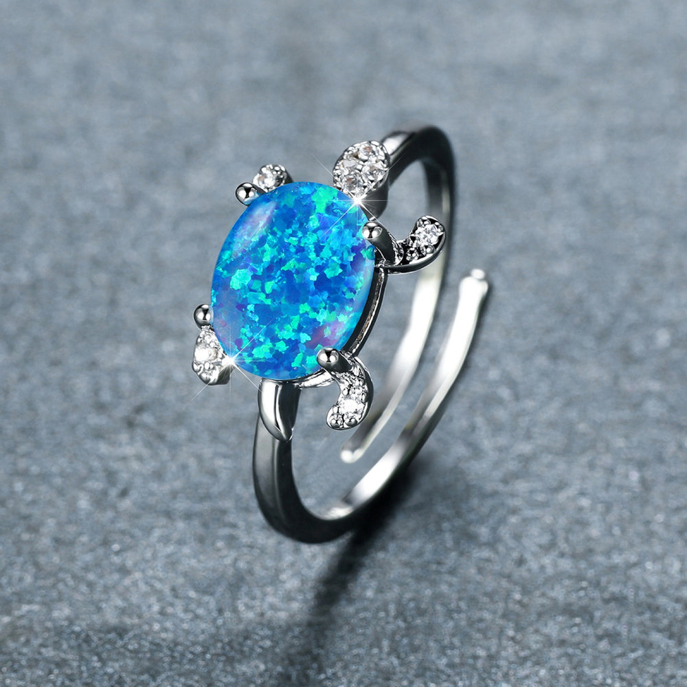 Silver-Tone Oval Blue Simulated Opal Sea Turtle Adjustable Open Ring