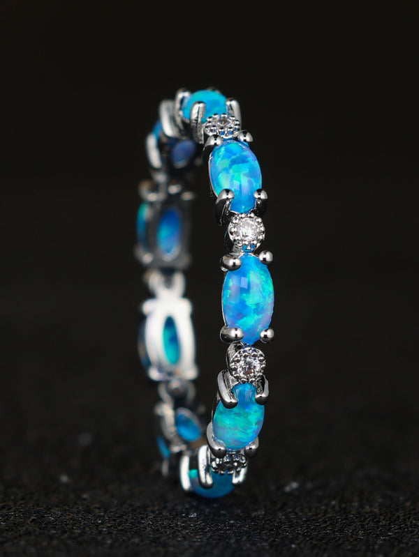 Sterling Silver Oval Blue Simulated Opal Eternity Band Ring