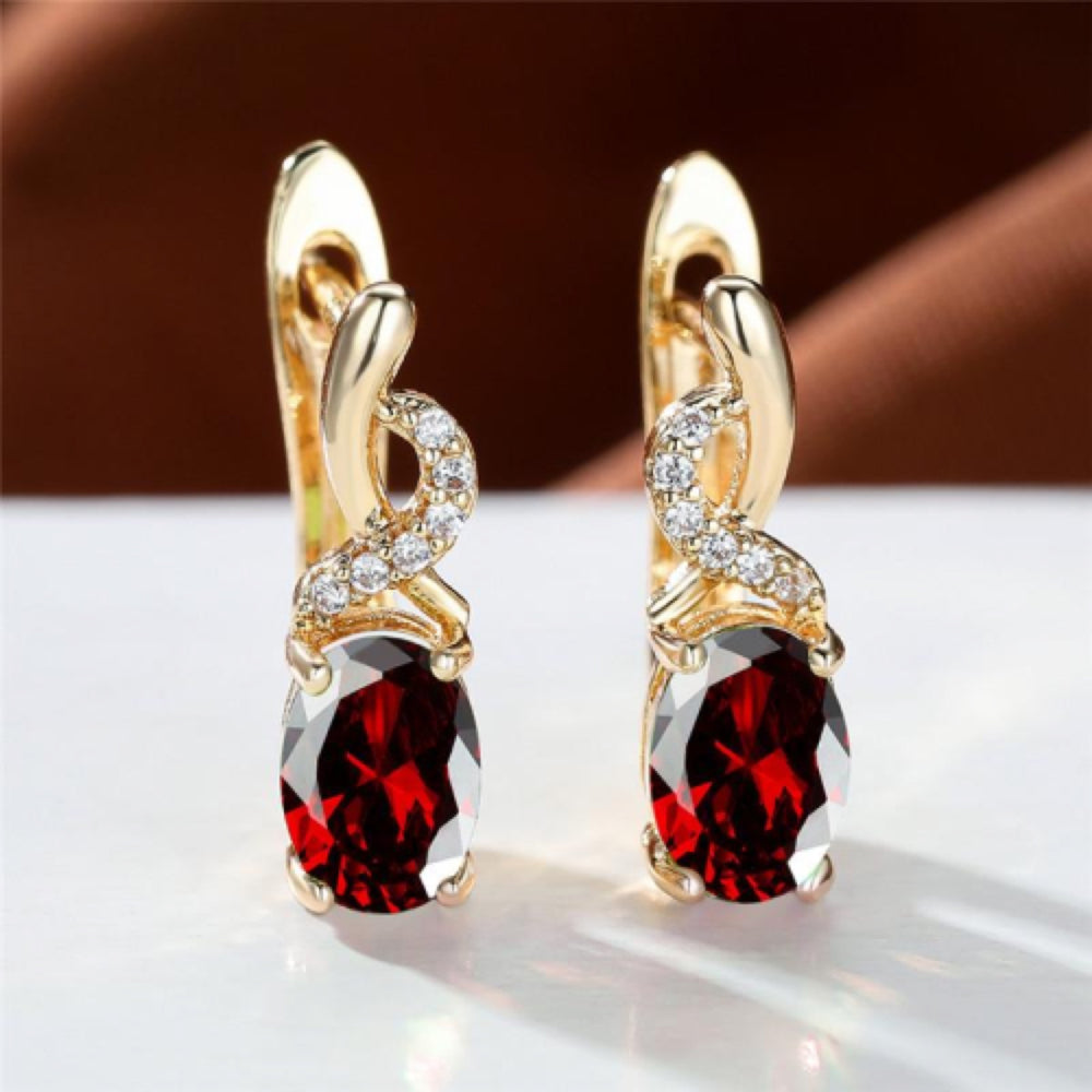 Champagne Gold-Tone Oval Red CZ Huggie Earrings with Ribbon Twist
