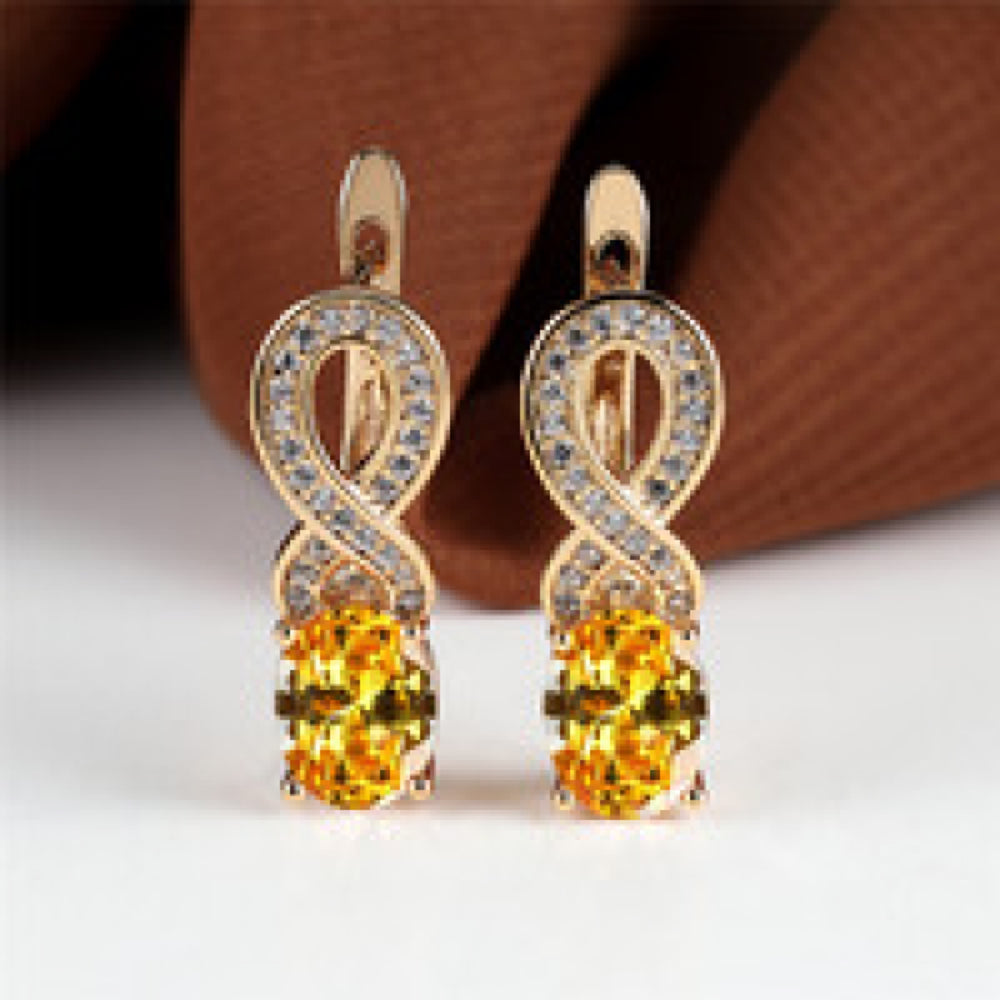 Champagne Gold-Tone Yellow Oval Crystal Infinity Huggie Earrings